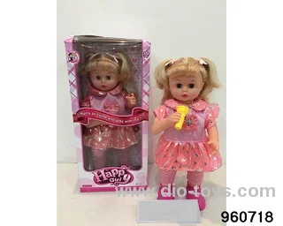 16inch Doll (with raised hands, walking and singing) in window box