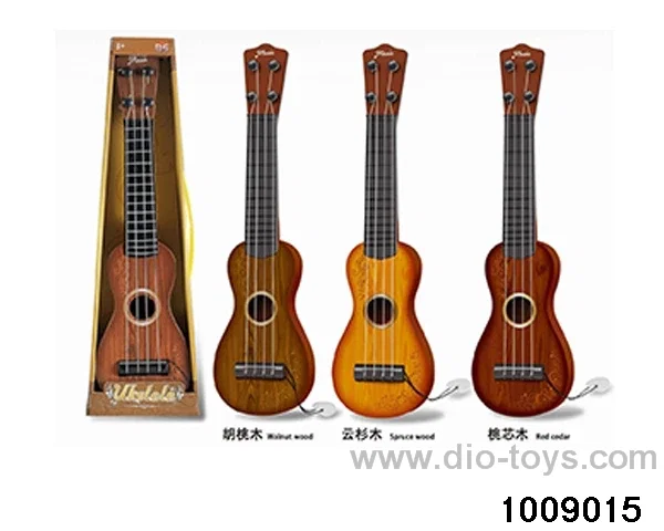 Ukriri four string guitar in display box