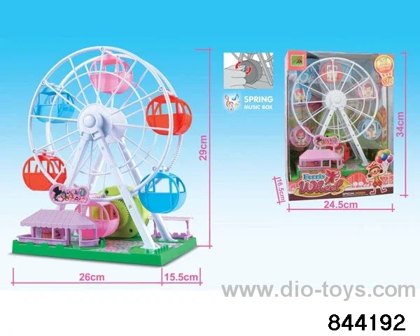 Ferris wheel music box in window box
